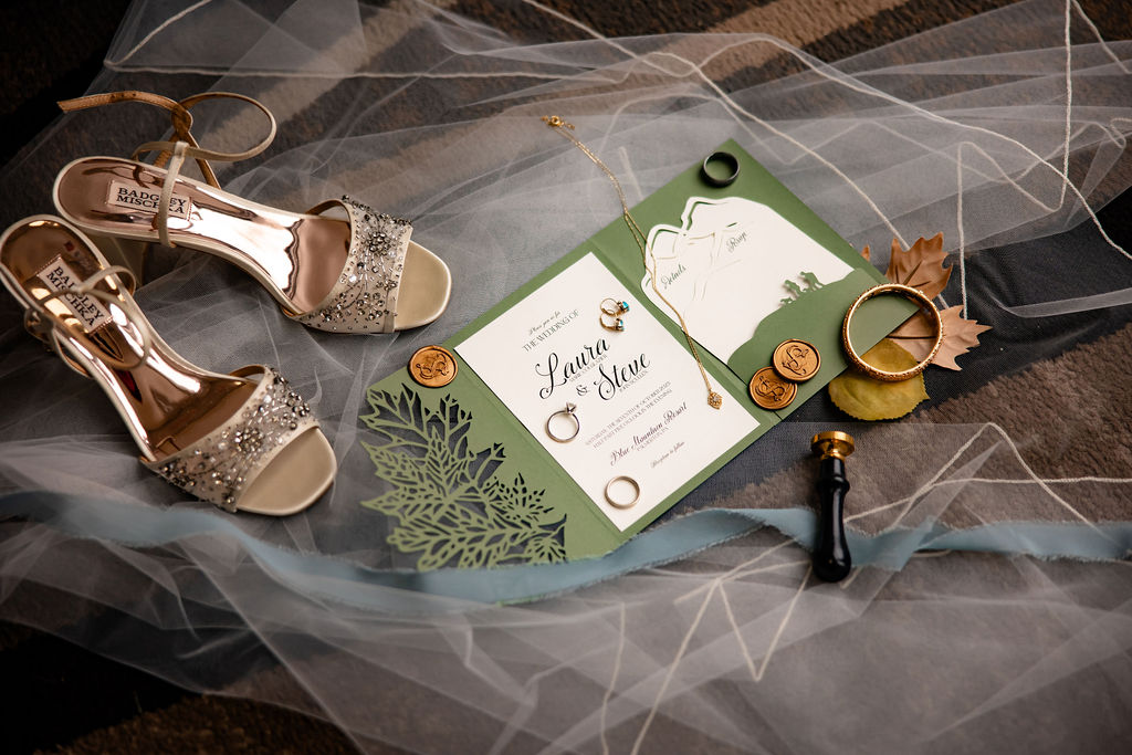 Heels and invitations on a veil. 